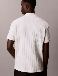 Poloshirt met all-over embleemlogo