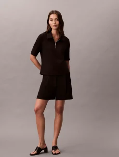 Polotop met rits en korte mouwen