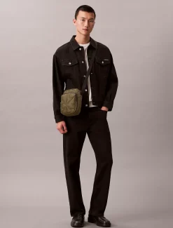 Puffer reportertas met monogram-logo