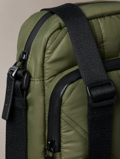 Puffer reportertas met monogram-logo
