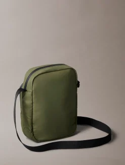 Puffer reportertas met monogram-logo