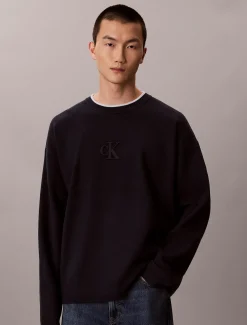 Relaxed sweater met monogram-logo in reliëf
