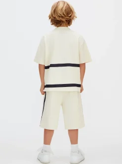 Relaxed varsity shorts met logo
