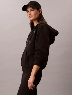 Relaxte hoodie met rits en monogram