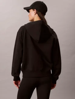 Relaxte hoodie met rits en monogram