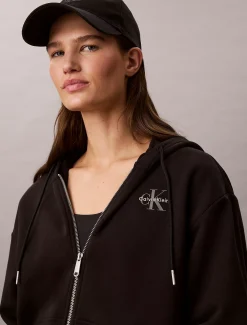 Relaxte hoodie met rits en monogram