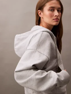 Relaxte hoodie met rits en monogram