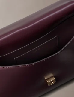 Schoudertas met monogram hardware