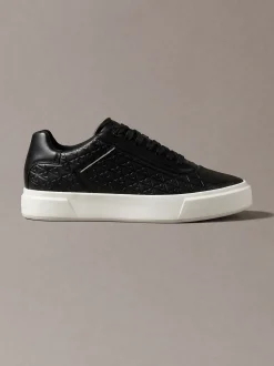 Sneakers met logo embleem in reliëf