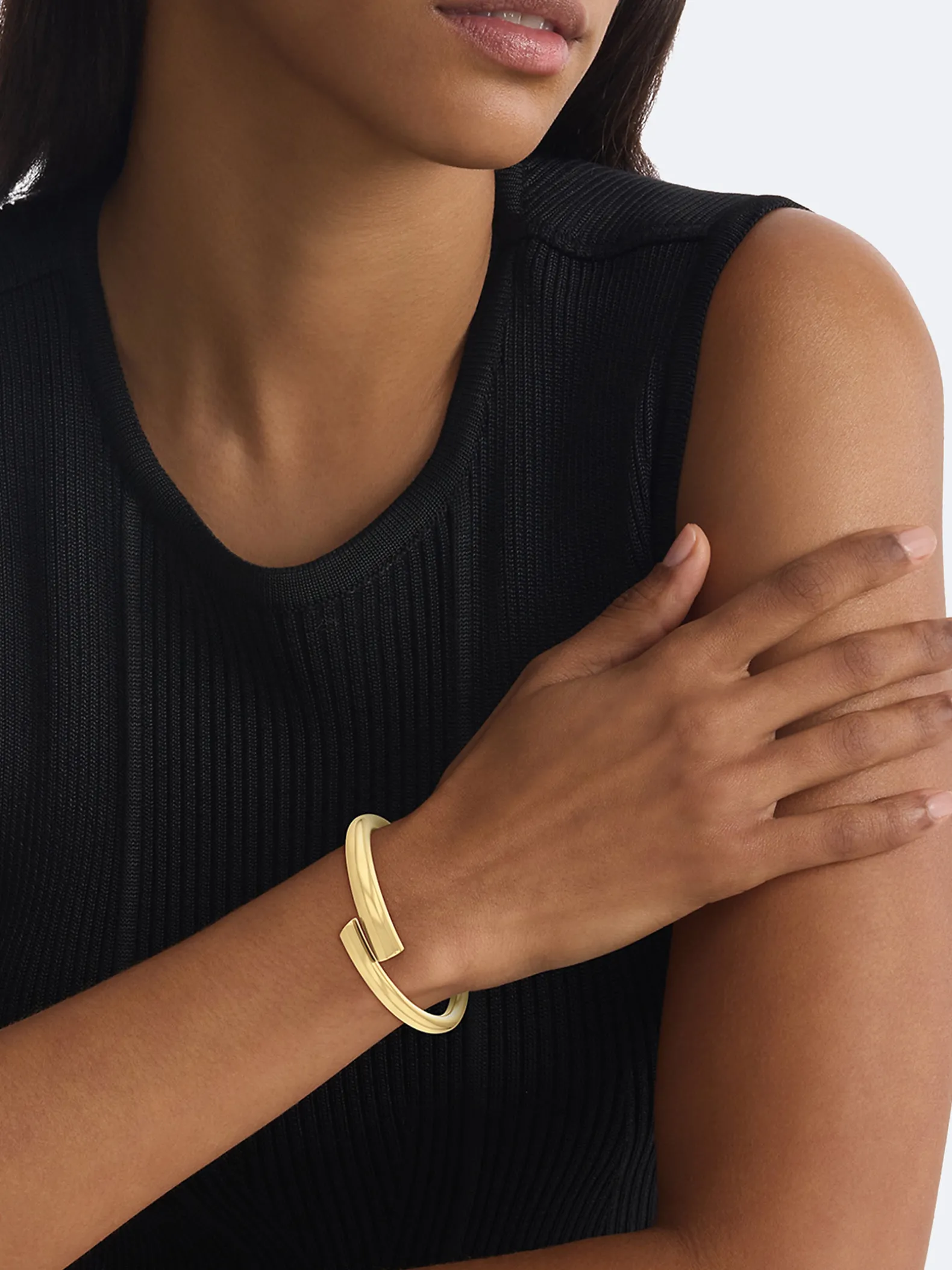 Spiraalbangle van verguld staal