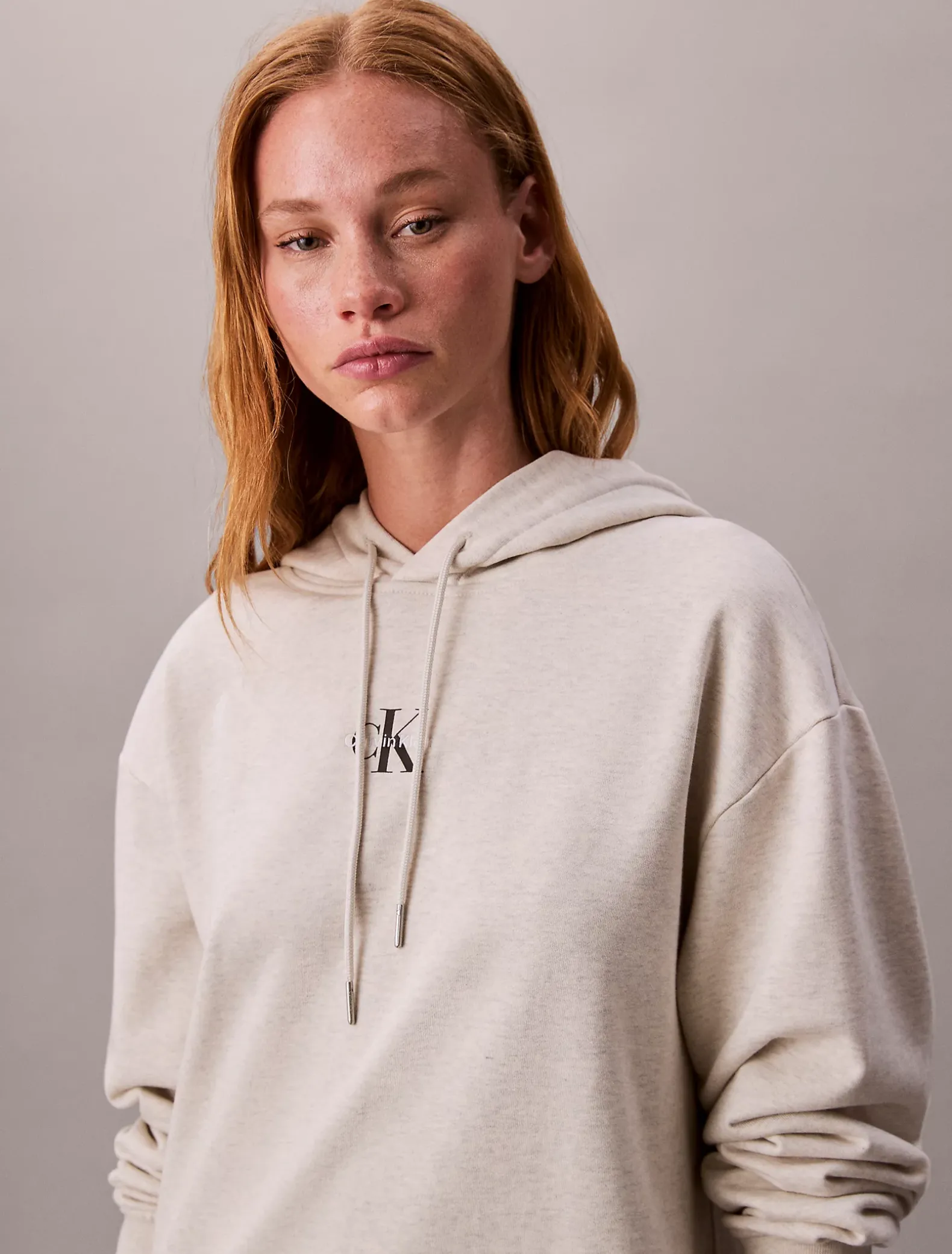 Sweatshirtjurk met capuchon en monogram
