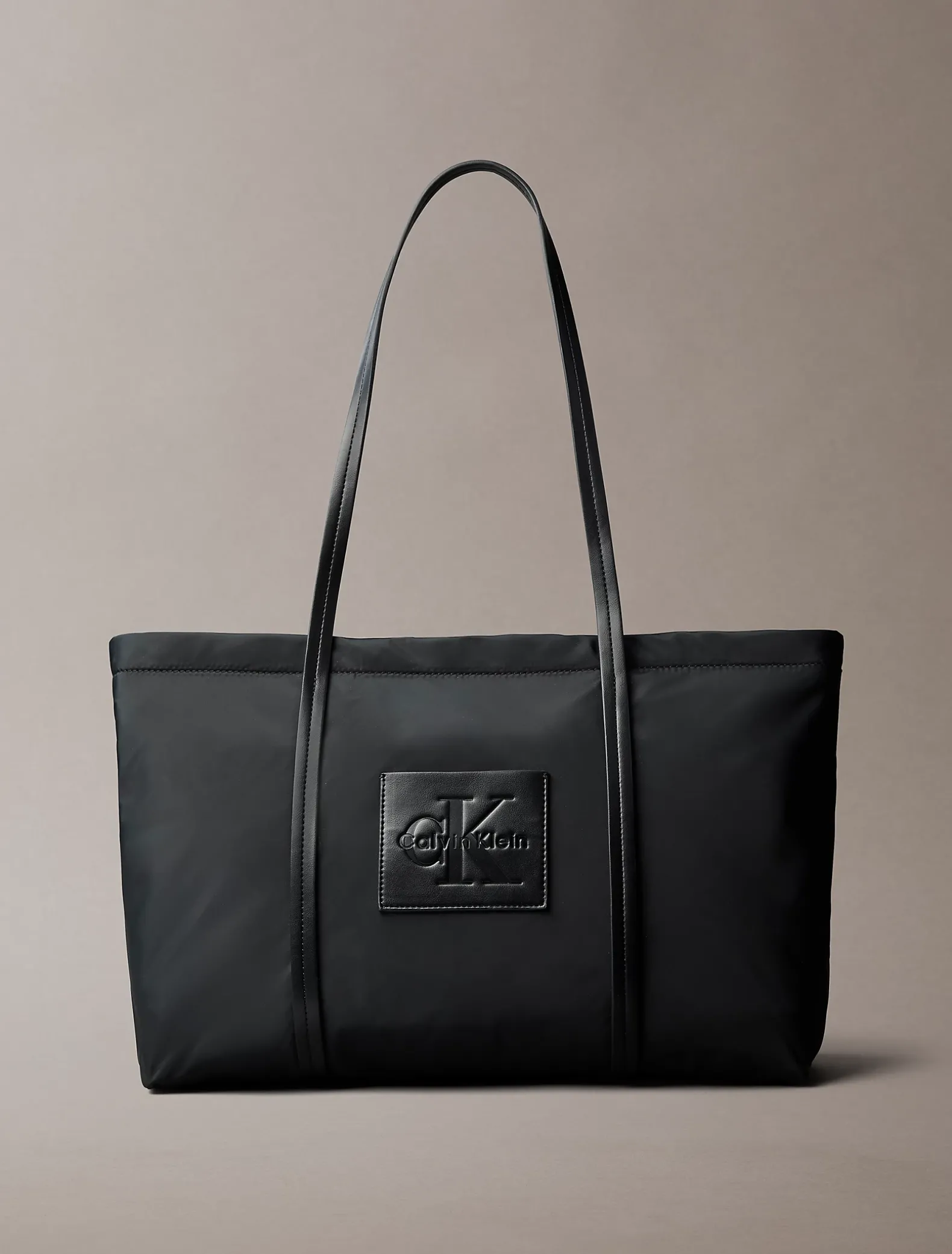 Tote bag met monologo in reliëf