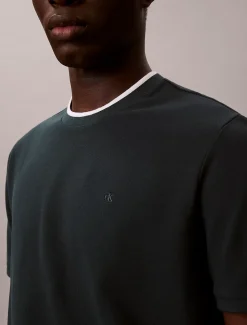T-shirt van piquékatoen met puntkraag
