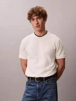 T-shirt van piquékatoen met puntkraag